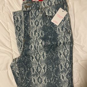 Snakeskin skinny jeans